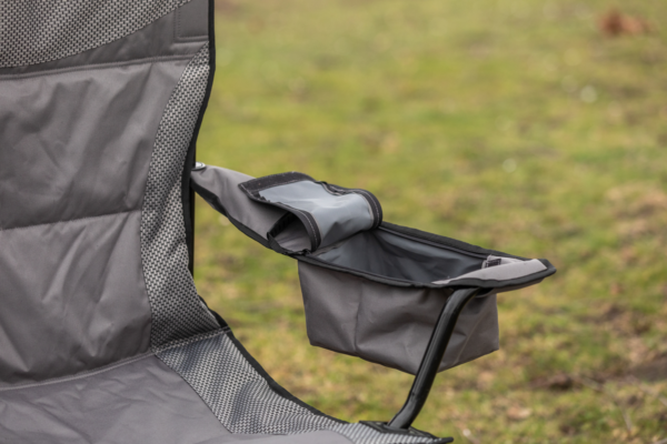 Coleman Maximus Sling Steel Chair with showing its a zippered pocket in the armrests.