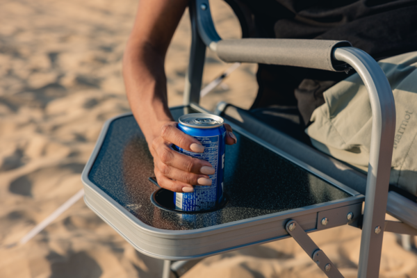 Coleman Deck chair with convenient side table with built in cup holder.